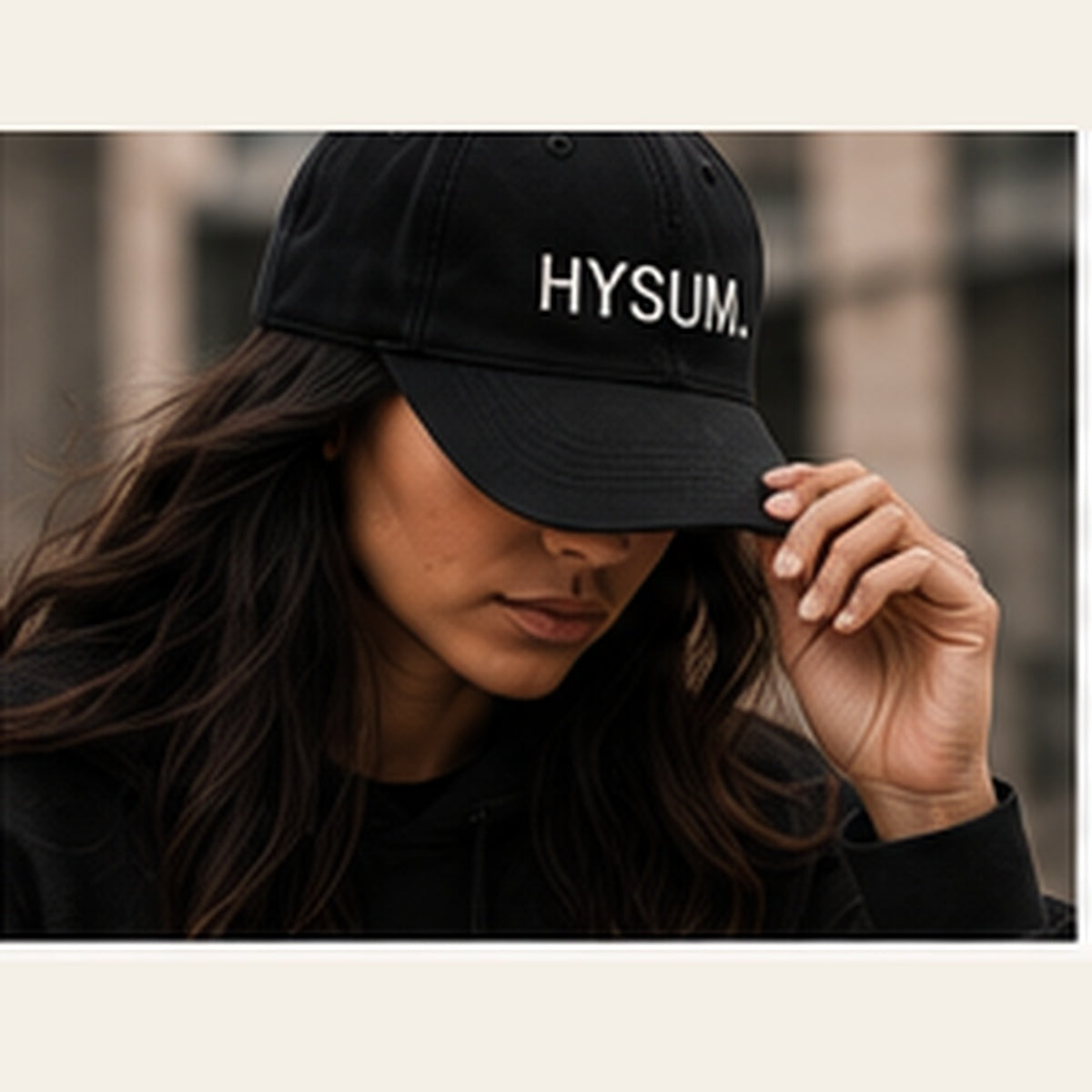 Lifestyle model wearing HYSUM Embroidered Cap