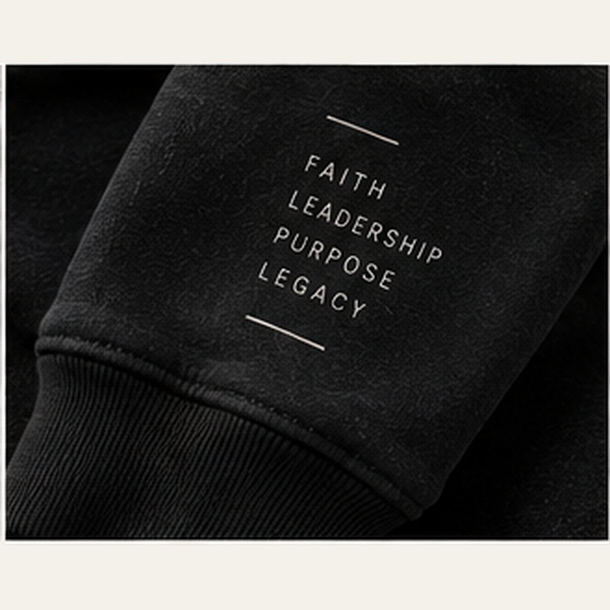 HYSUM sweatshirt detail with Faith Leadership Purpose Legacy sleeve design