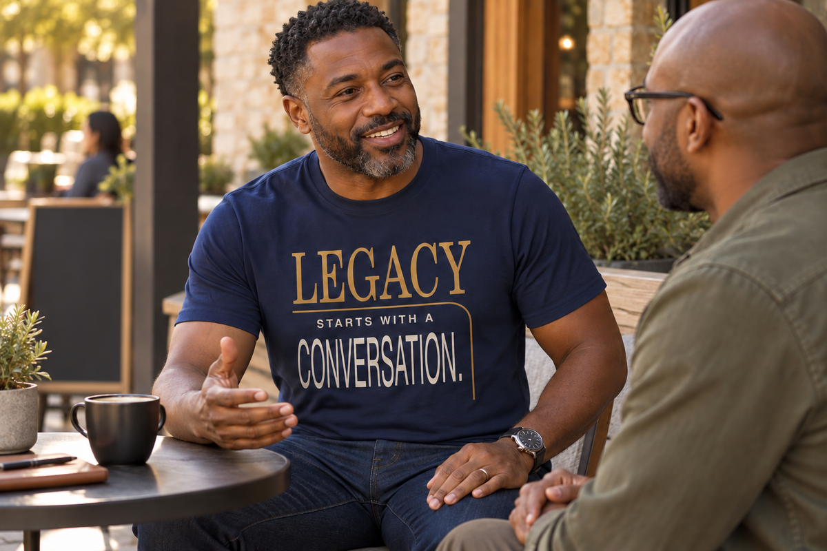 Two men in conversation, one wearing the New Horizon Unplugged Legacy Starts With a Conversation T-shirt