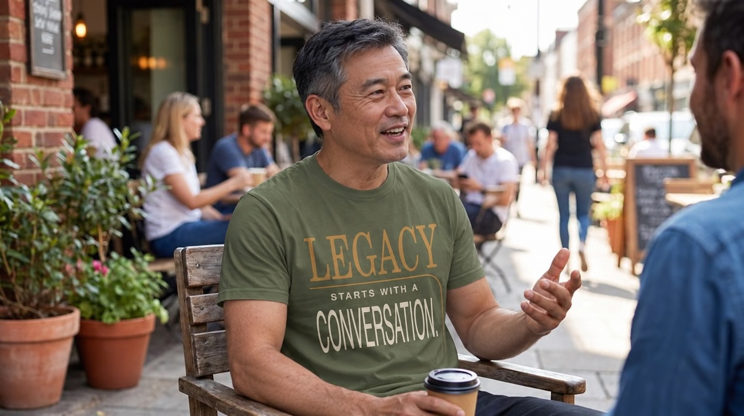 East Asian man wearing the New Horizon Unplugged Legacy Starts With a Conversation shirt